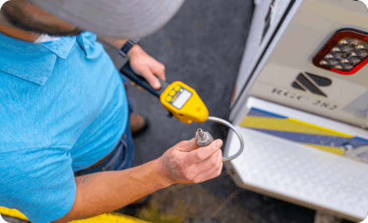 Overhead view of a person working with a gas detector