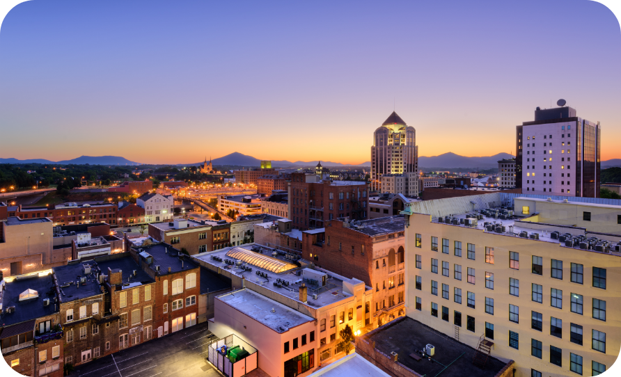 An aerial view of downtown Roanoke, VA at dusk.